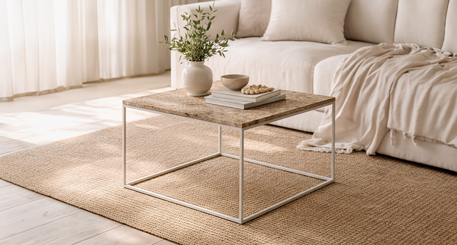 Wooden coffee table with built-in shelf space, placed on a light rug beside a cream sofa.